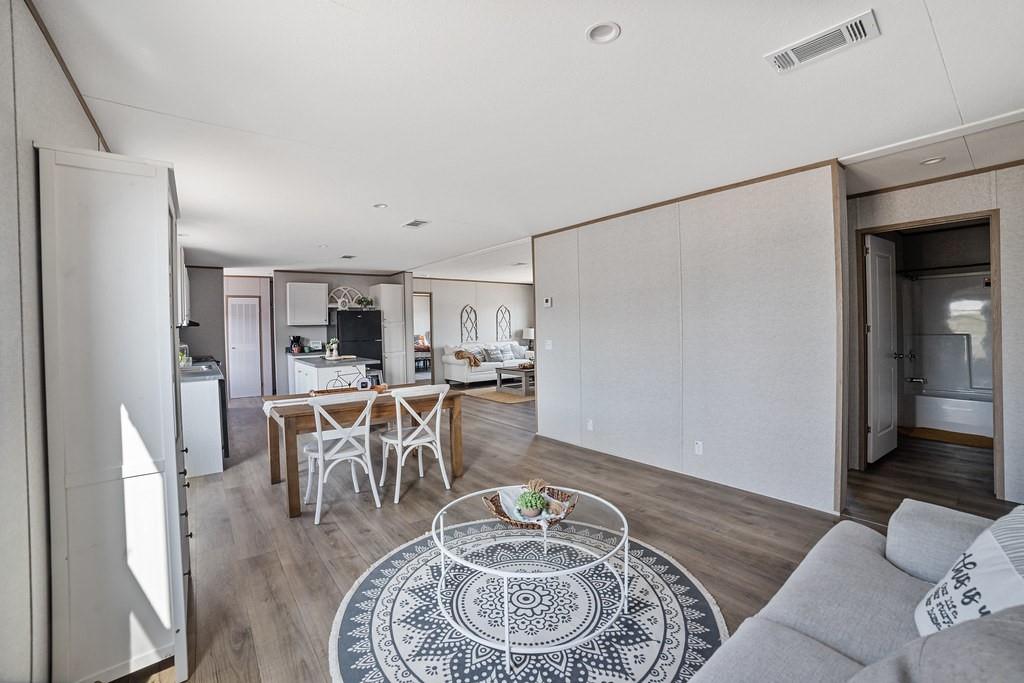 4127 Denver Road Sunset, TX 76270 - Photo 28 of 34 a living room with furniture and a table