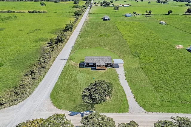 a view of a golf course with a yard