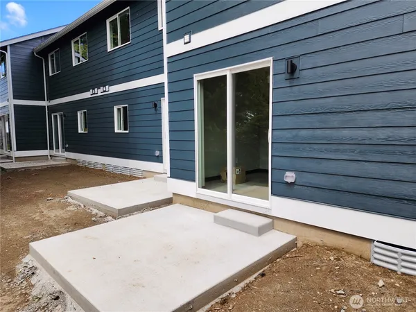 a view of a backyard of a house