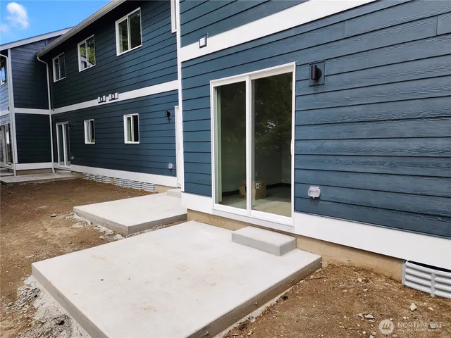 a view of a backyard of a house
