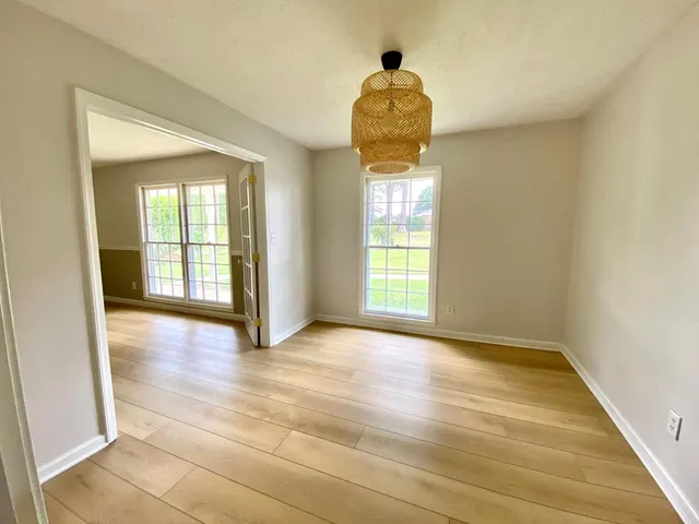 a view of an empty room and window