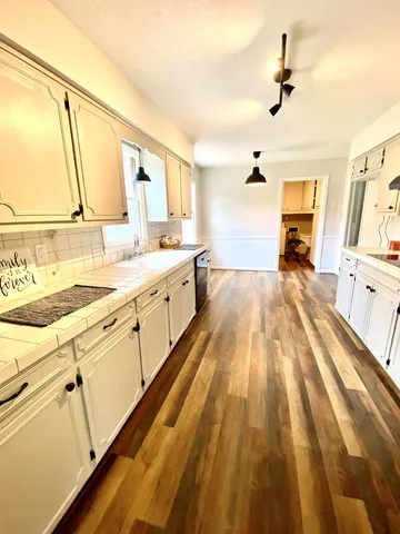 a large kitchen with a lot of counter space