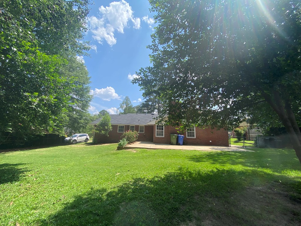 4222 Will Rhoades Drive Columbus, GA 31909 - Photo 41 of 41 a view of a house with a yard porch and sitting area