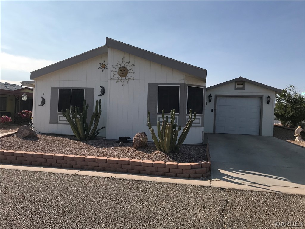2066 East El Rodeo Road, Unit 5 Fort Mohave, AZ 86426 - Photo 1 of 34 Front of Home with attached garage