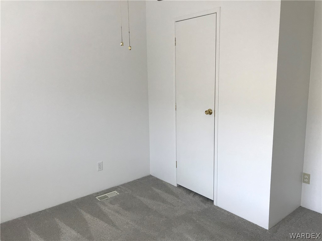 2066 East El Rodeo Road, Unit 5 Fort Mohave, AZ 86426 - Photo 20 of 34 Bedroom 2 Closet
