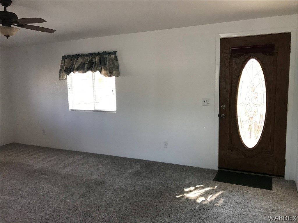 2066 East El Rodeo Road, Unit 5 Fort Mohave, AZ 86426 - Photo 28 of 34 Looking toward living area and front door from hallway