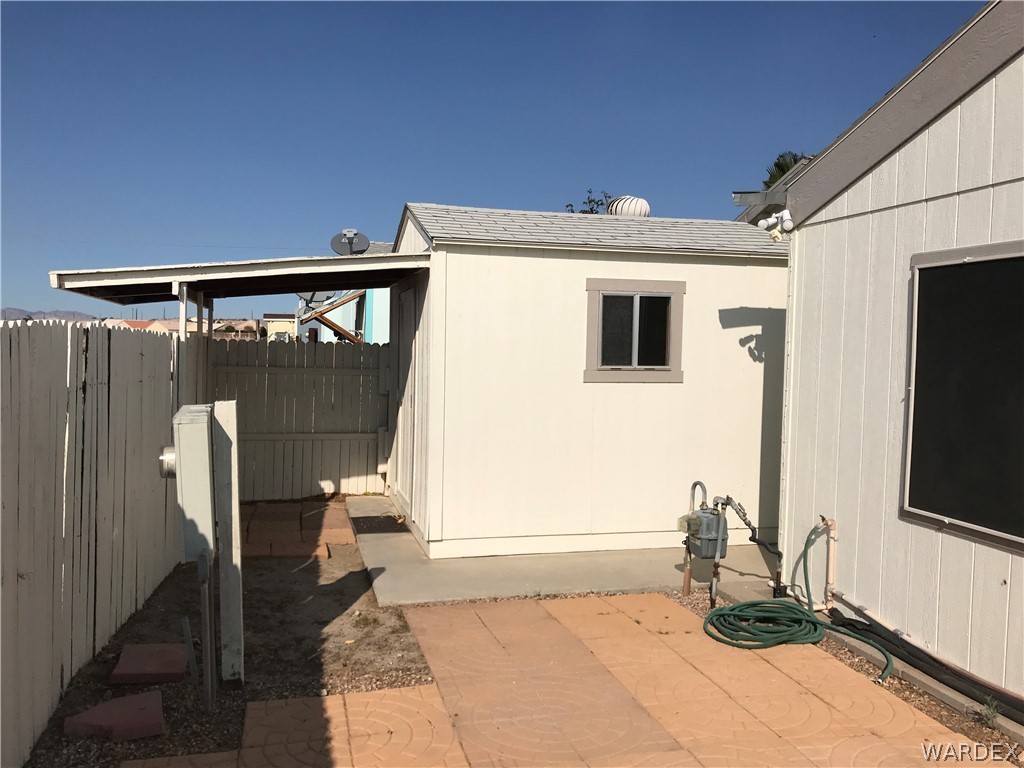 2066 East El Rodeo Road, Unit 5 Fort Mohave, AZ 86426 - Photo 31 of 34 Shed in back yard behind garage