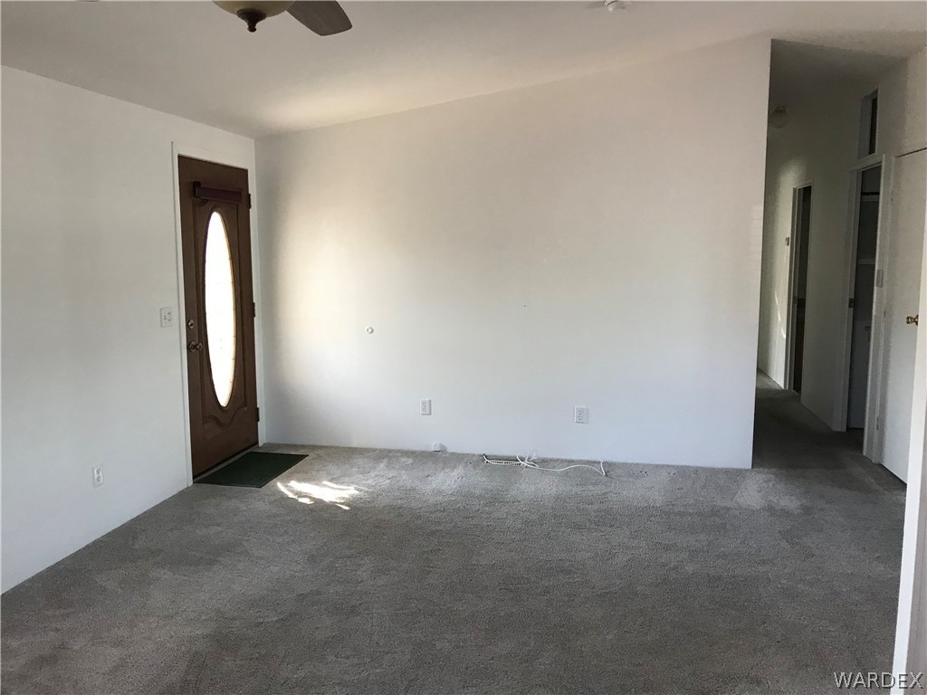 2066 East El Rodeo Road, Unit 5 Fort Mohave, AZ 86426 - Photo 6 of 34 Living room - looking toward hallway to the bedrooms