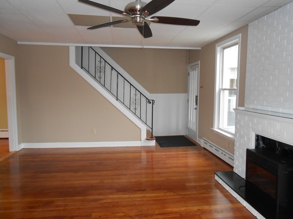 20 Lawrence Road Chicopee, MA 01013 - Photo 11 of 20 a view of an empty room with wooden floor and a window