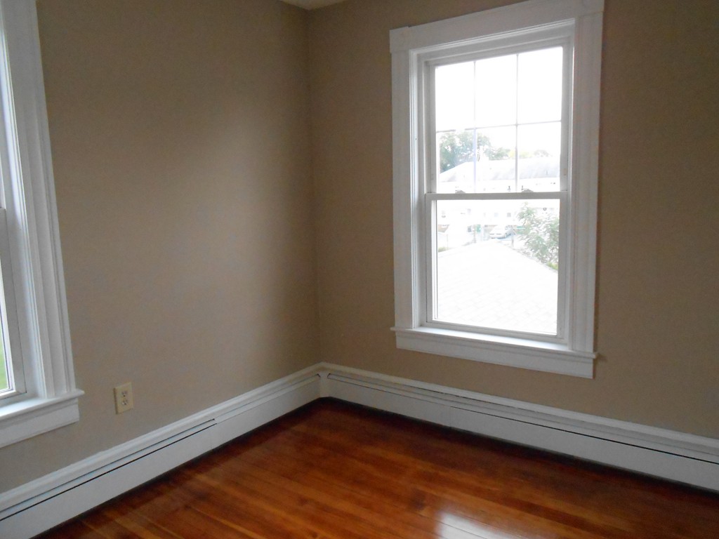 20 Lawrence Road Chicopee, MA 01013 - Photo 15 of 20 a view of an empty room with wooden floor and a window