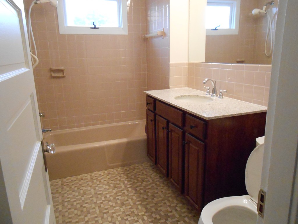 20 Lawrence Road Chicopee, MA 01013 - Photo 17 of 20 a bathroom with a sink a toilet and shower