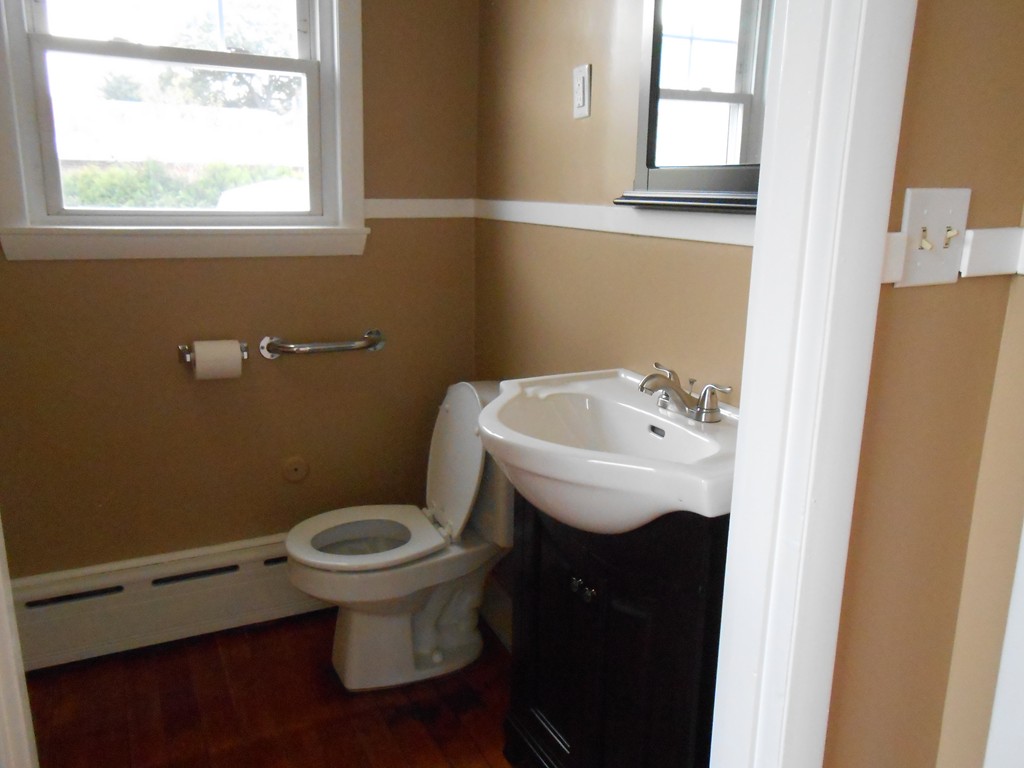 20 Lawrence Road Chicopee, MA 01013 - Photo 7 of 20 a bathroom with a sink and a toilet