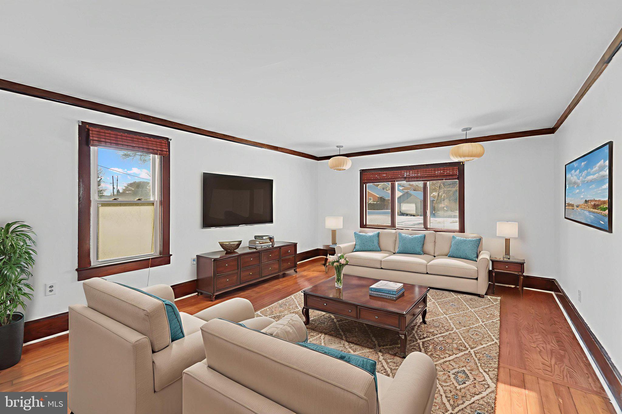 200 Union Street Salem, NJ 08079 - Photo 21 of 43 a living room with furniture and a flat screen tv