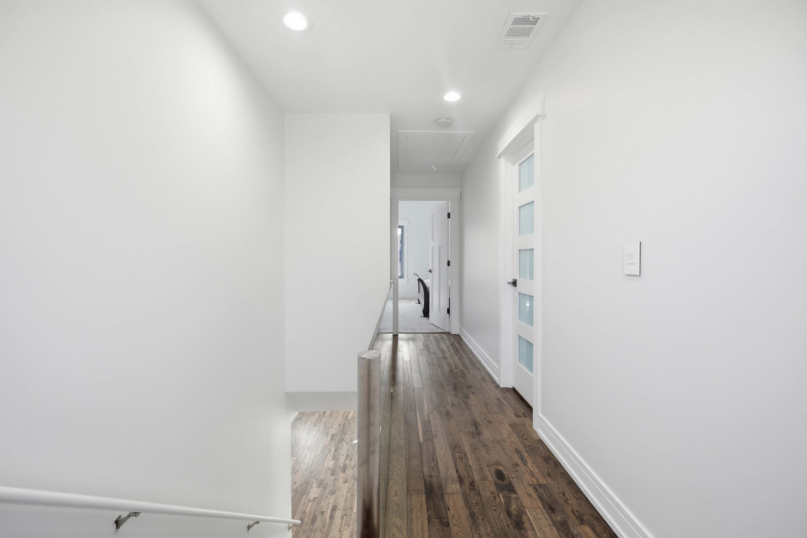 1020 Hill Avenue Elgin, IL 60120 - Photo 21 of 43 a view of a hallway with wooden floor