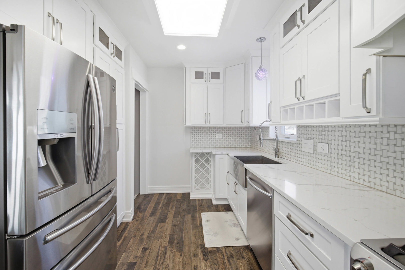 1020 Hill Avenue Elgin, IL 60120 - Photo 6 of 43 a kitchen with a sink stove and refrigerator