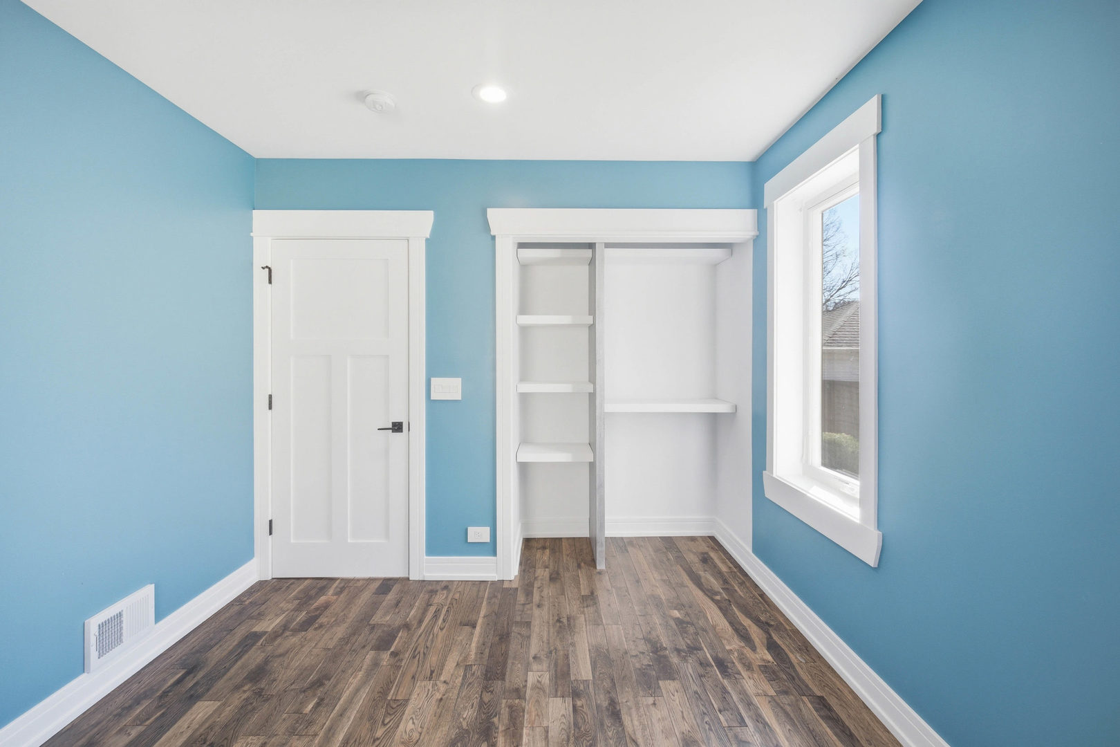 1020 Hill Avenue Elgin, IL 60120 - Photo 10 of 43 a view of a room with wooden floor and window