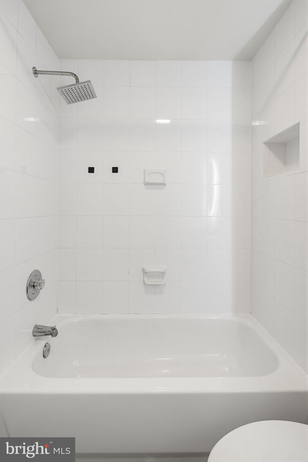 8266 Spring Branch Court Laurel, MD 20723 - Photo 58 of 73 Tub shower in lower level bathroom