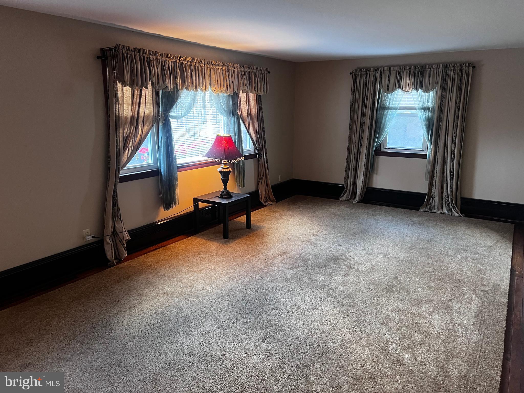 636 Ridgeway Road Birdsboro, PA 19508 - Photo 5 of 14 an empty room with windows
