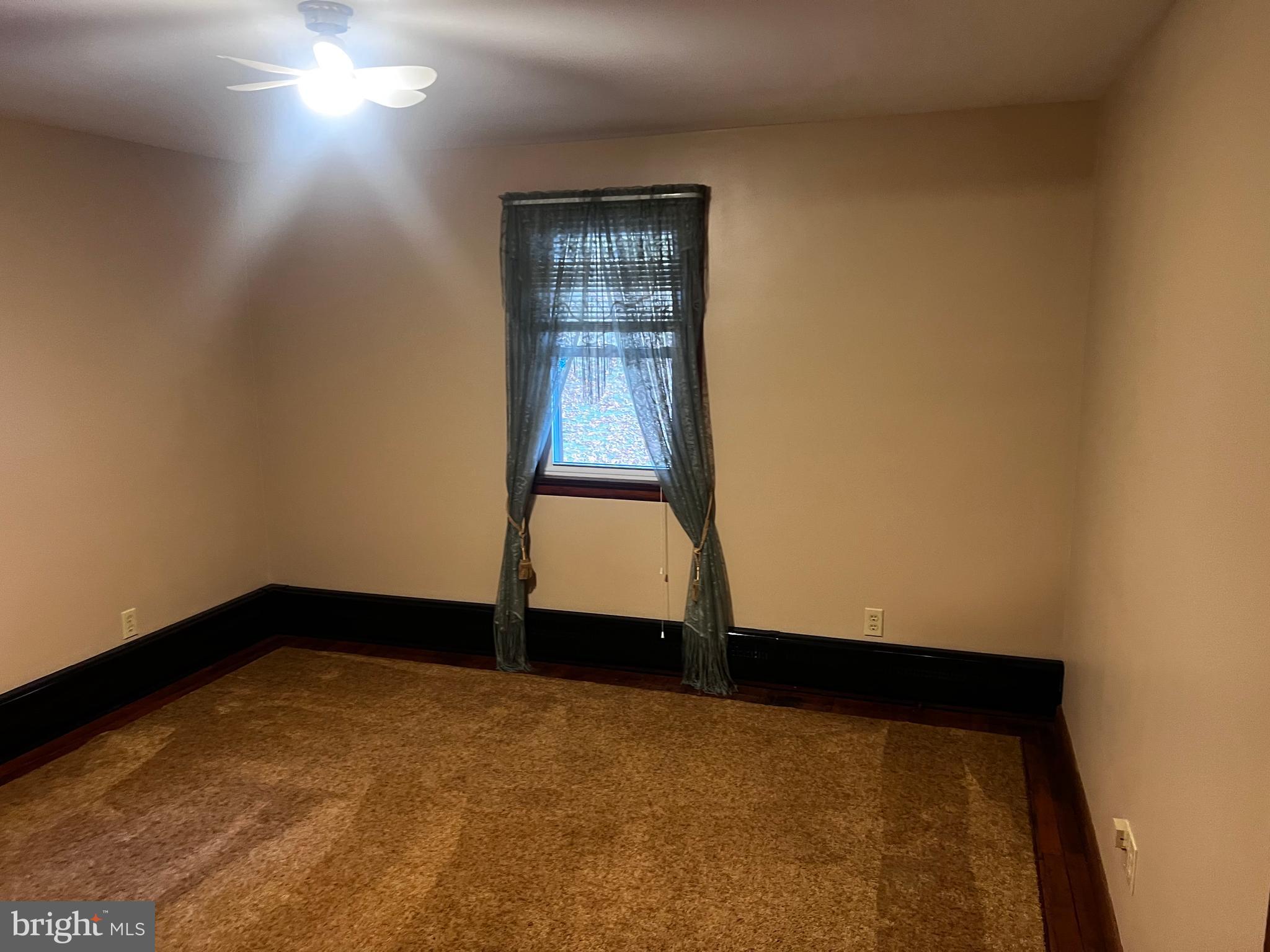 636 Ridgeway Road Birdsboro, PA 19508 - Photo 9 of 14 an empty room with windows