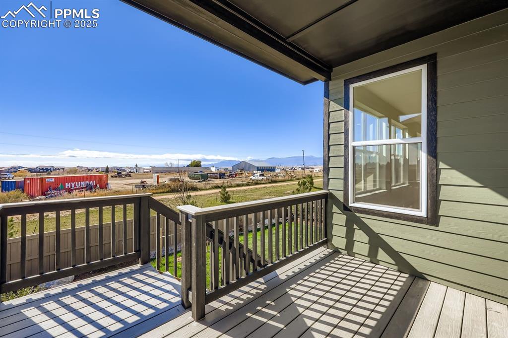 7989 Polson Drive Colorado Springs, CO 80908 - Photo 26 of 28 Wooden terrace with a mountain view