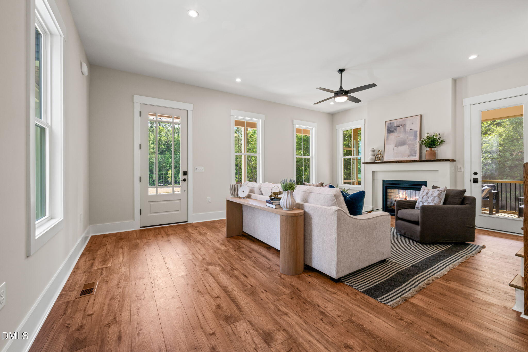 400 Pilot Ridge Road Zebulon, NC 27597 - Photo 6 of 51 a living room with furniture and a fireplace