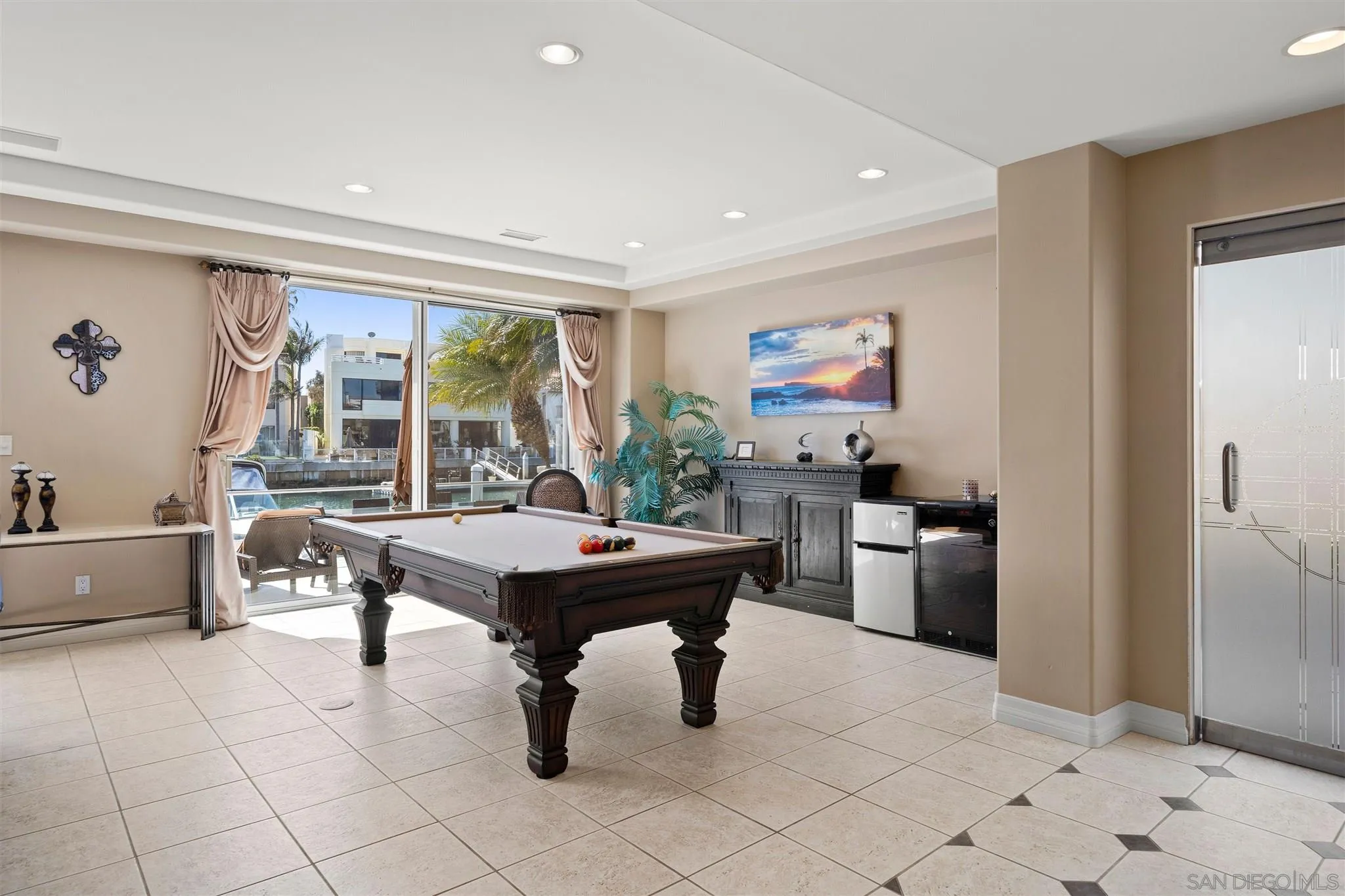 24 Sandpiper Strand Coronado, CA 92118 - Photo 11 of 55 a view of a dining room with furniture window and outside view