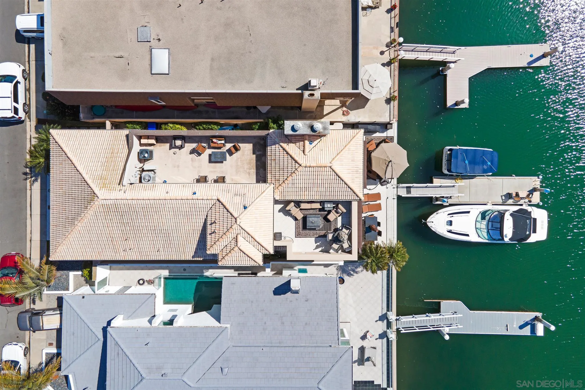 24 Sandpiper Strand Coronado, CA 92118 - Photo 15 of 55 an aerial view of a house with table and chairs