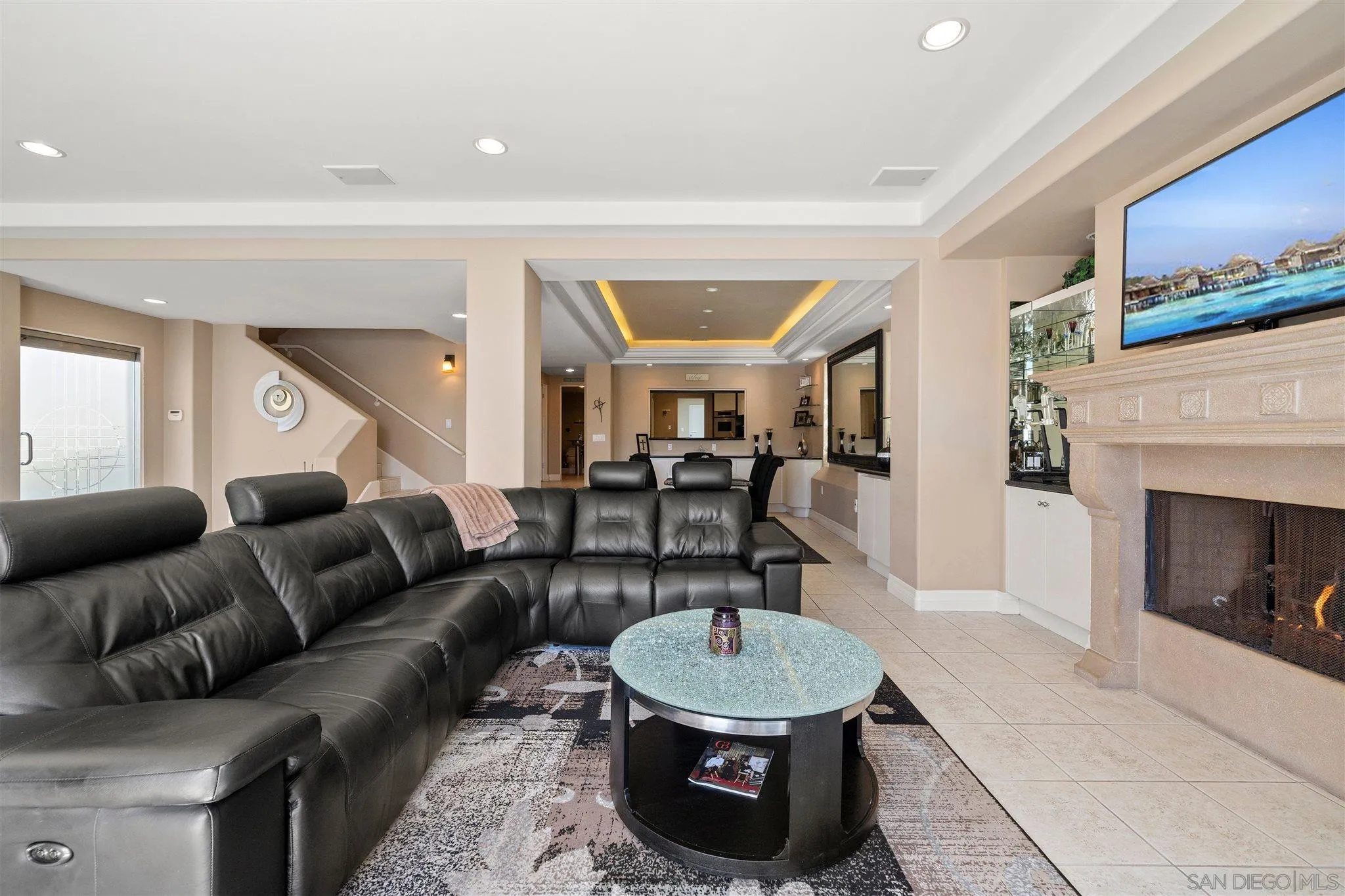 24 Sandpiper Strand Coronado, CA 92118 - Photo 18 of 55 a living room with furniture and a fireplace