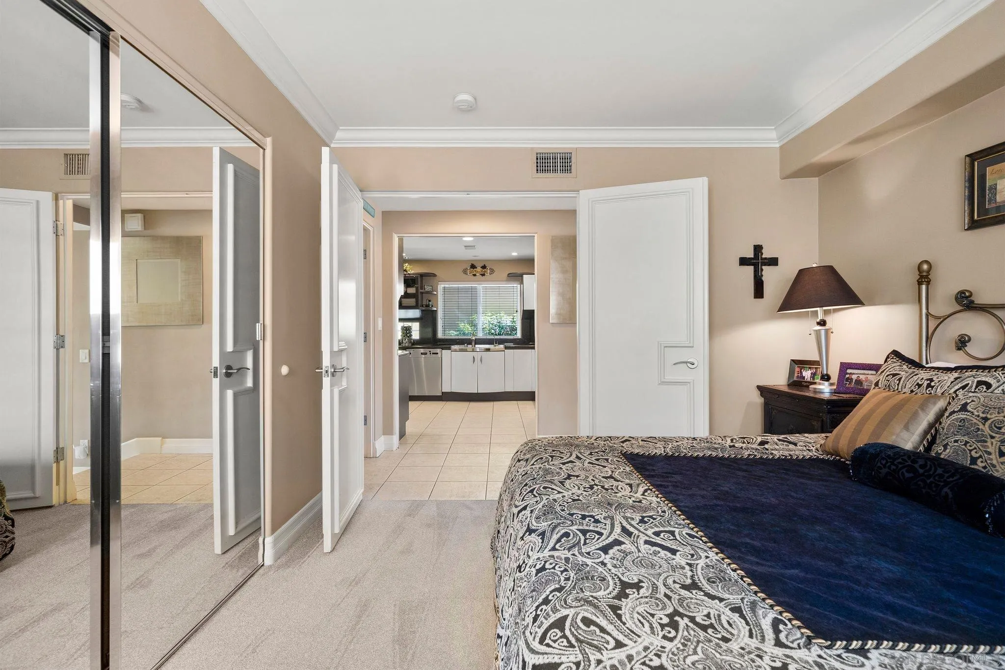 24 Sandpiper Strand Coronado, CA 92118 - Photo 29 of 55 a bedroom with a bed and a dresser