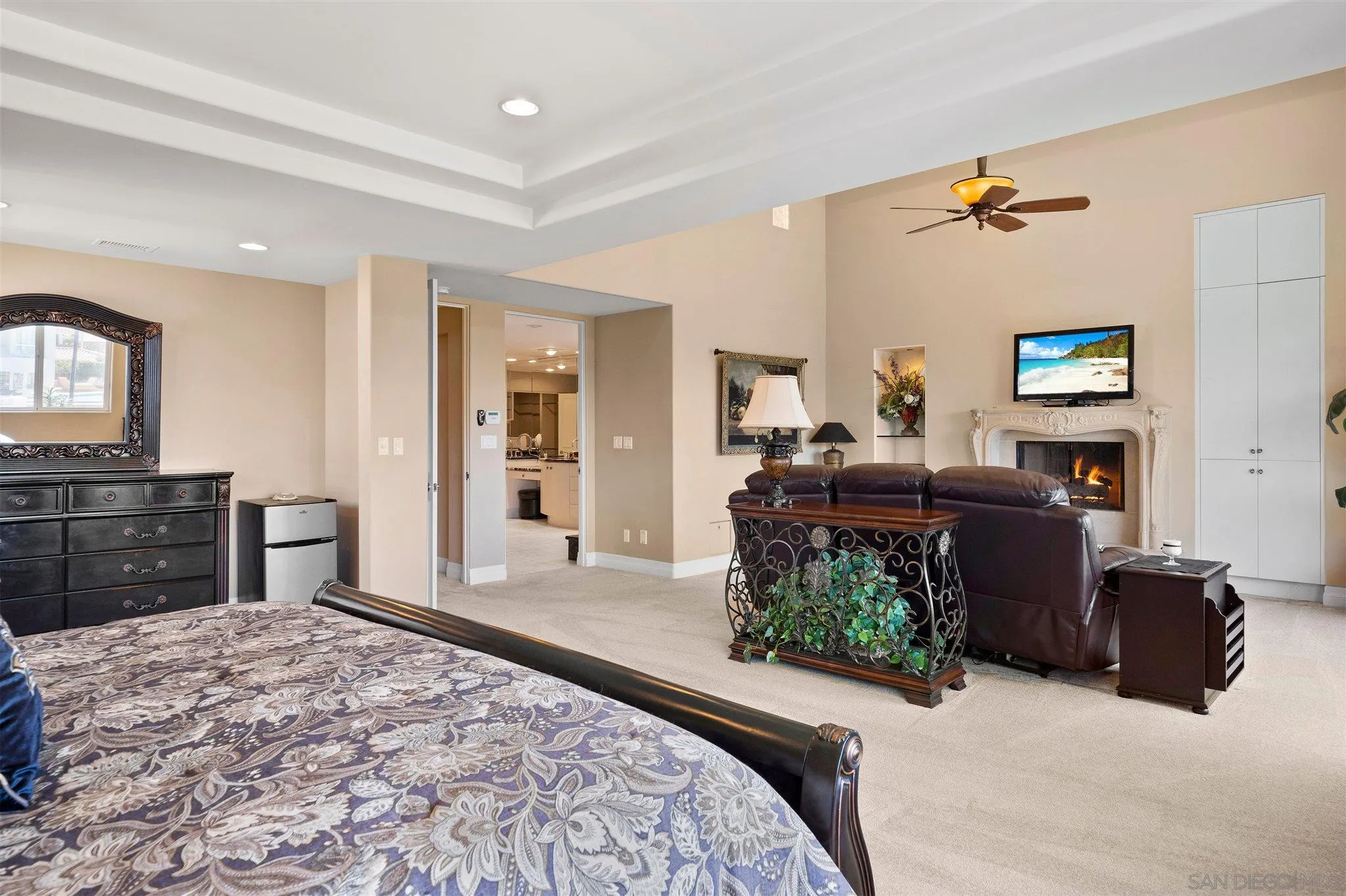 24 Sandpiper Strand Coronado, CA 92118 - Photo 36 of 55 a bedroom with a bed and dresser with mirror