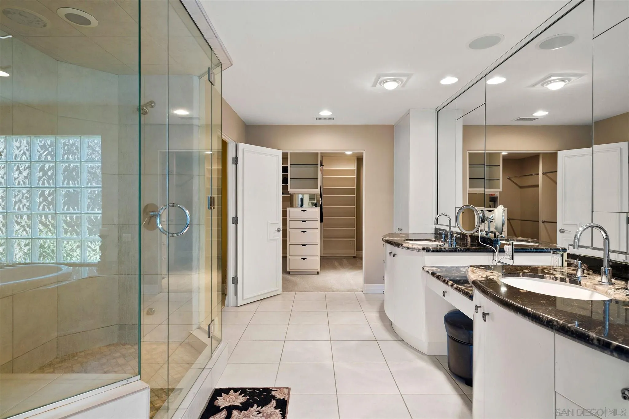 24 Sandpiper Strand Coronado, CA 92118 - Photo 38 of 55 a large kitchen with stainless steel appliances granite countertop a sink and cabinets