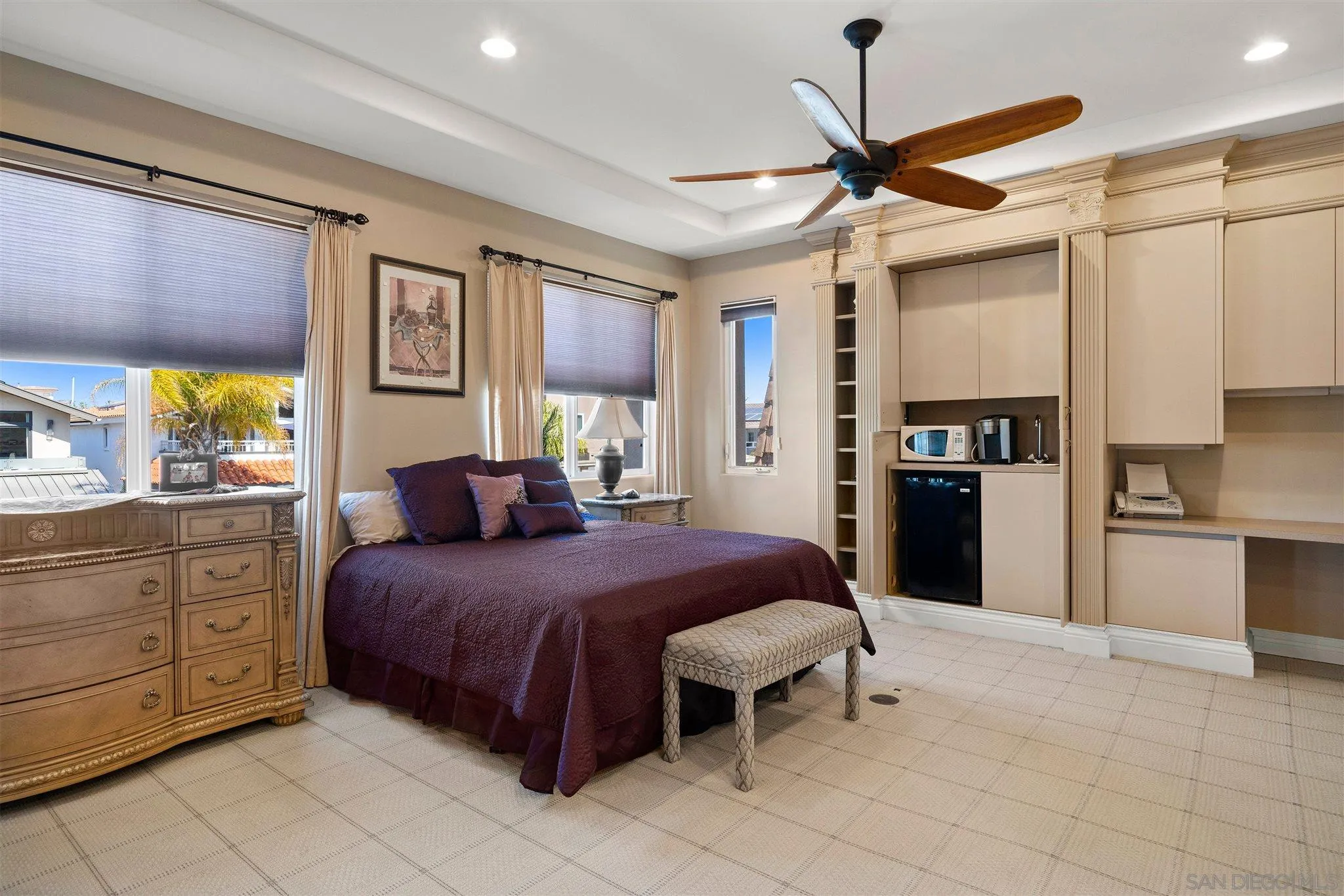 24 Sandpiper Strand Coronado, CA 92118 - Photo 45 of 55 a bedroom with a bed and a refrigerator