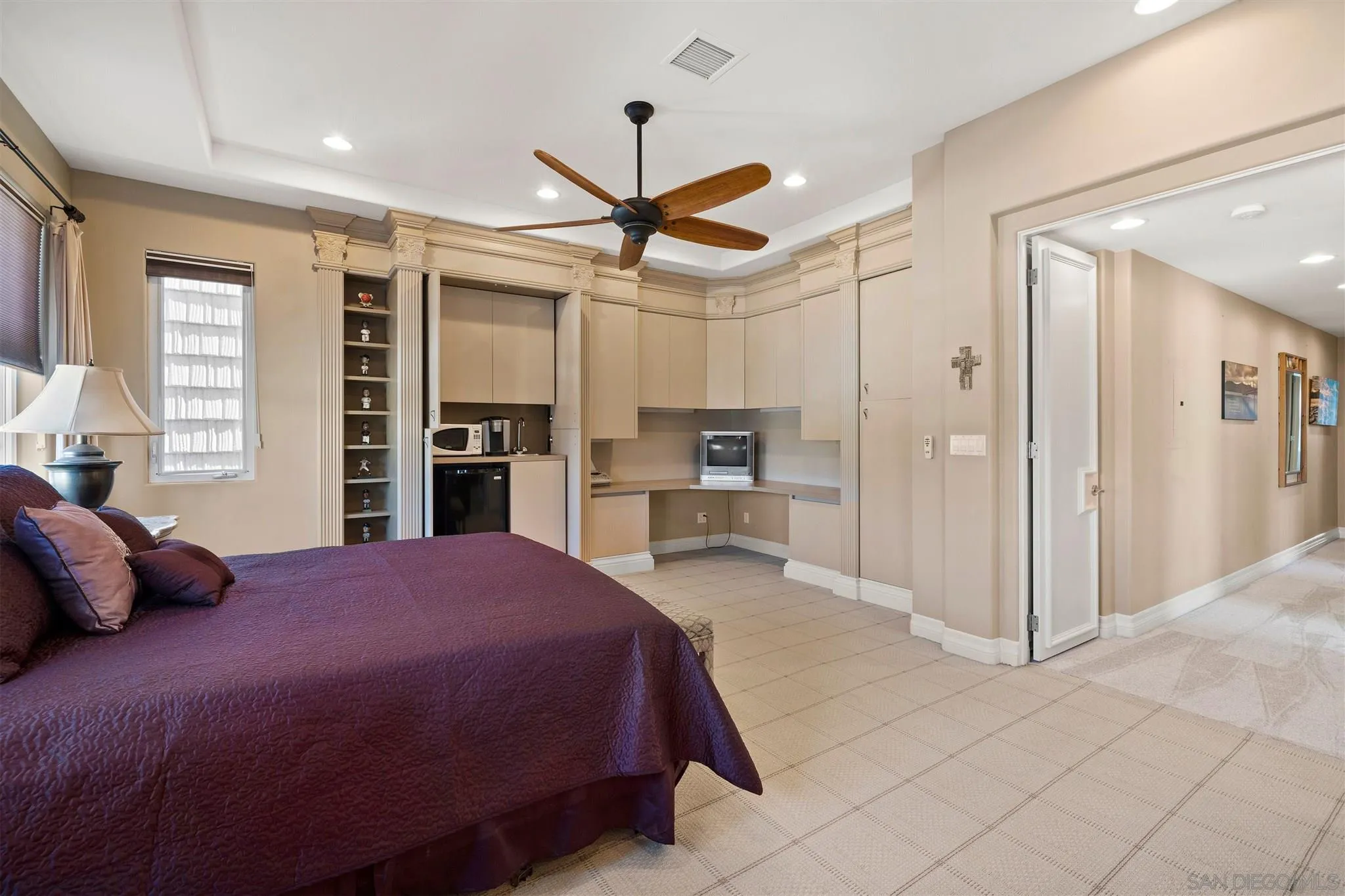 24 Sandpiper Strand Coronado, CA 92118 - Photo 48 of 55 a spacious bedroom with a bed and a large mirror