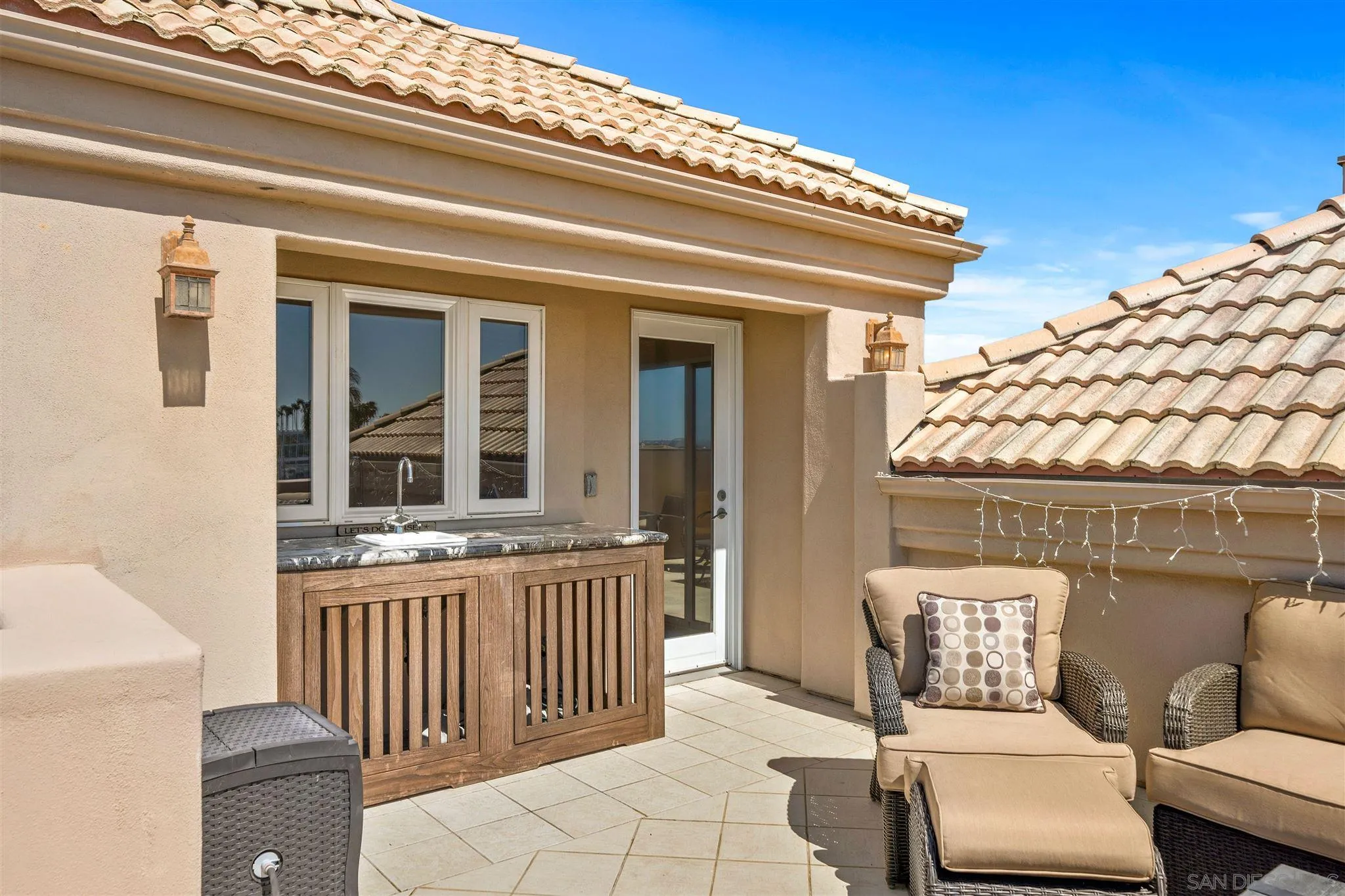 24 Sandpiper Strand Coronado, CA 92118 - Photo 51 of 55 a view of a chair and table in the balcony