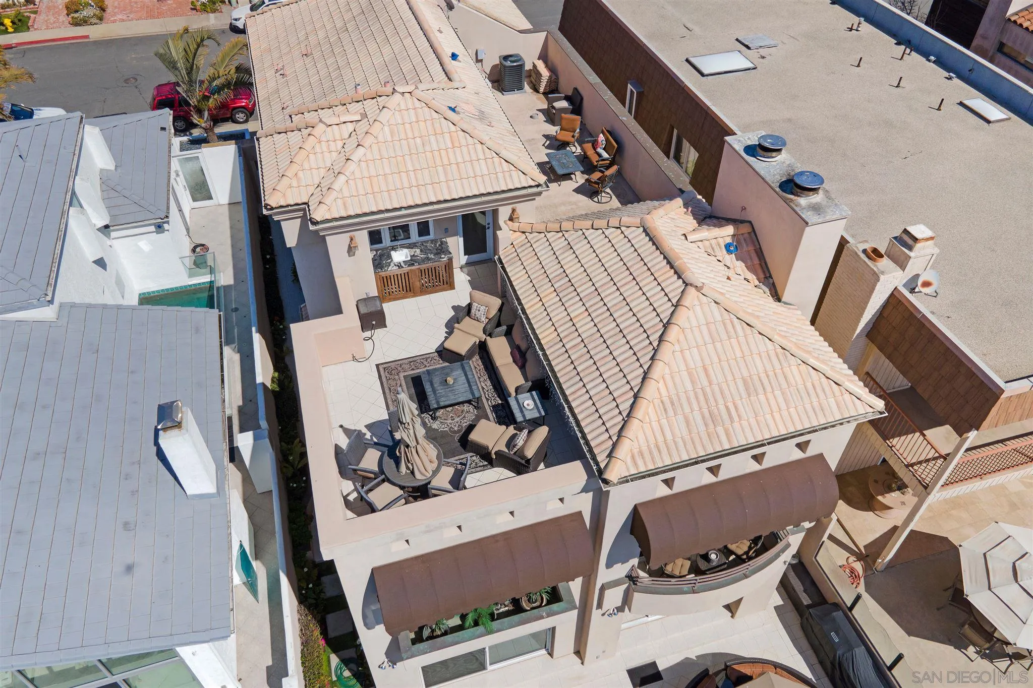 24 Sandpiper Strand Coronado, CA 92118 - Photo 52 of 55 an aerial view of a house with roof deck and furniture