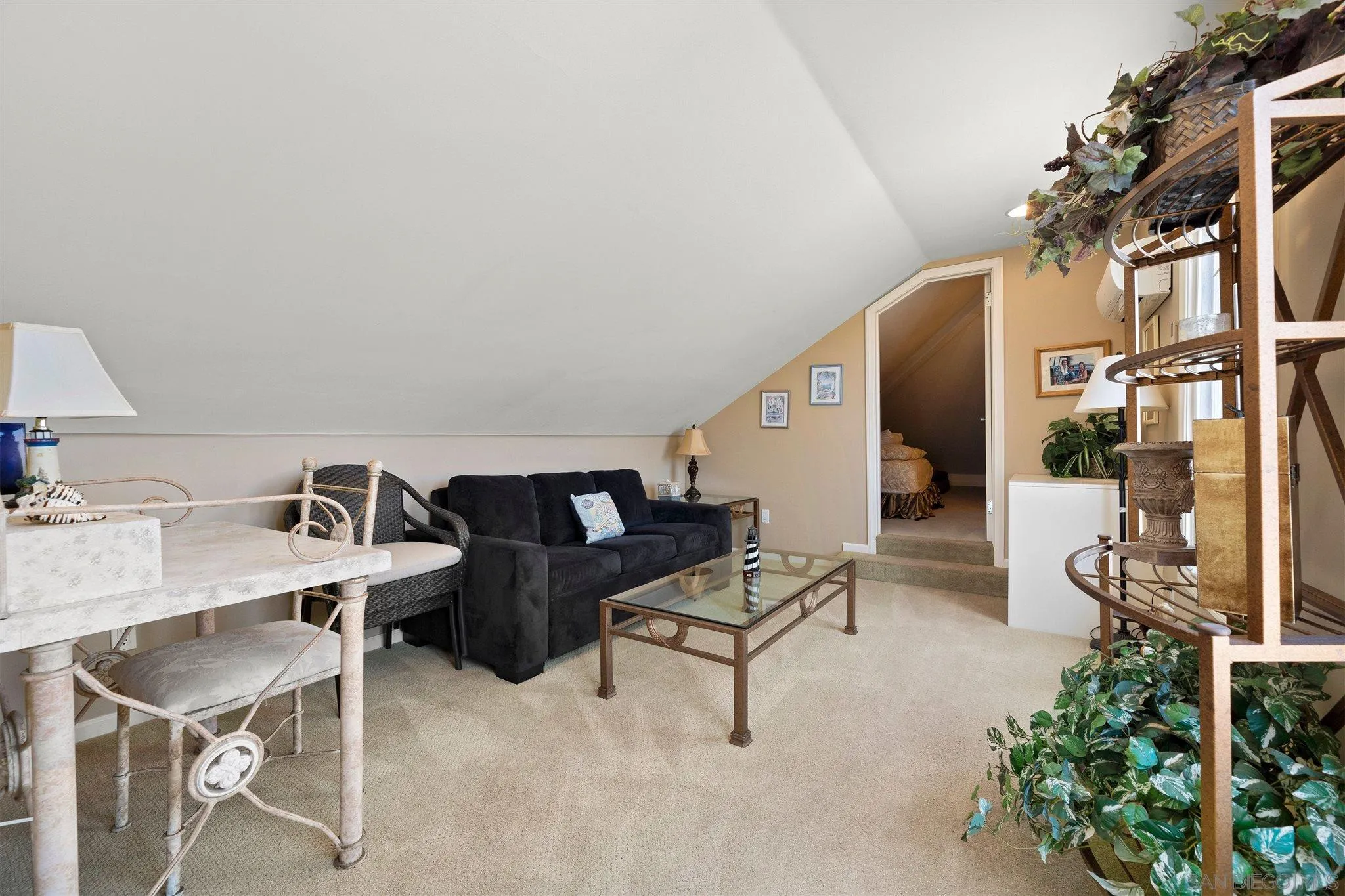 24 Sandpiper Strand Coronado, CA 92118 - Photo 54 of 55 a roof deck with table and chairs and potted plants