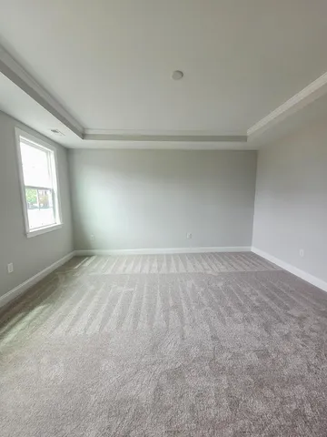 a bathroom with a sink a tub and a mirror