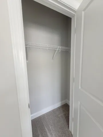 a view of balcony with wooden floor and floor