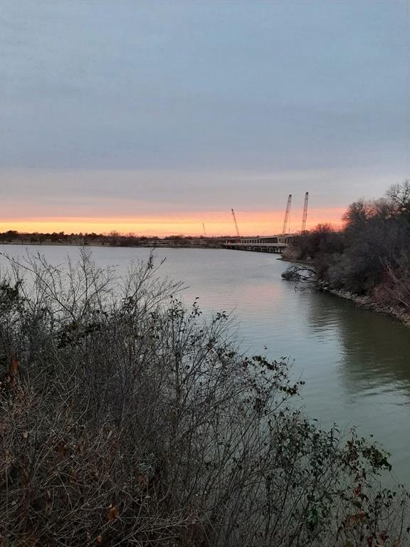 7028 Edgewater Trail Fort Worth, TX 76135 - Photo 2 of 12 a view of lake and mountain