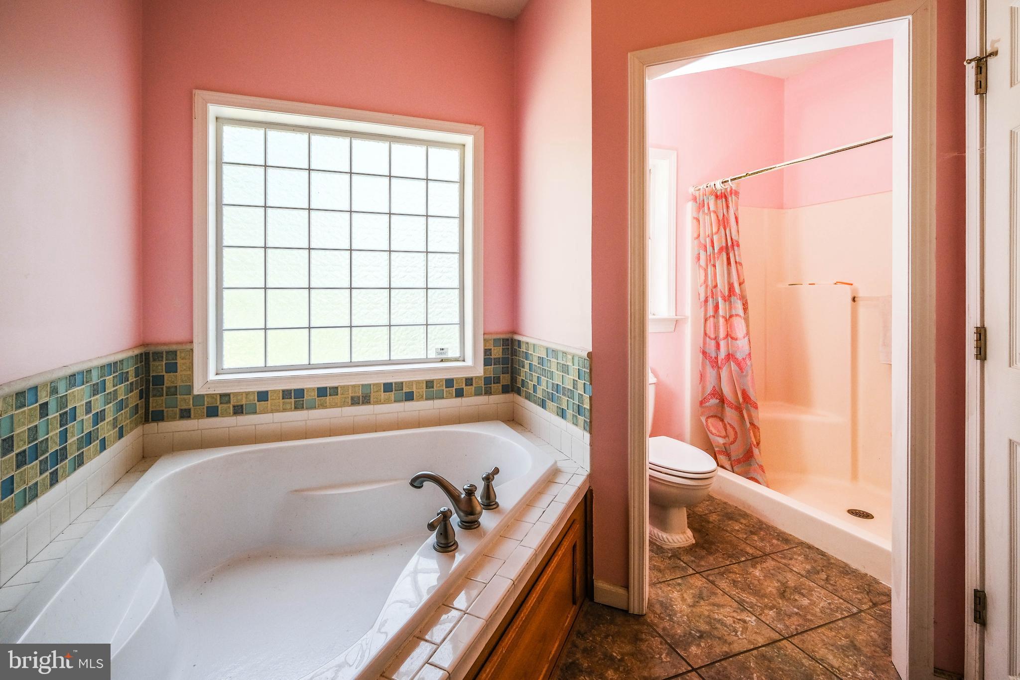 1195 Shangri-La Road Bentonville, VA 22610 - Photo 31 of 64 a bath tub sitting next to a window