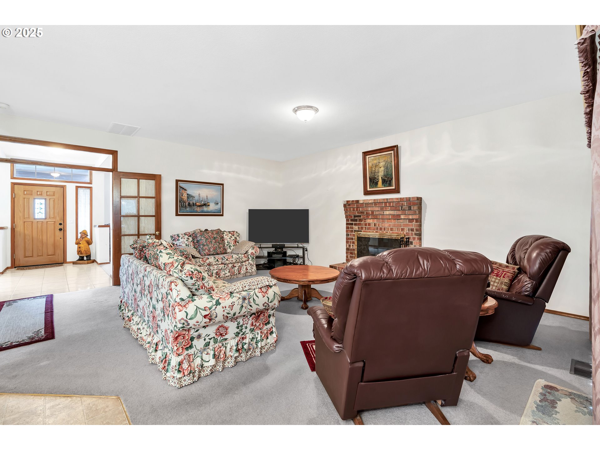 7829 Southwest 174th Place Beaverton, OR 97007 - Photo 12 of 45 a living room with furniture and a couch