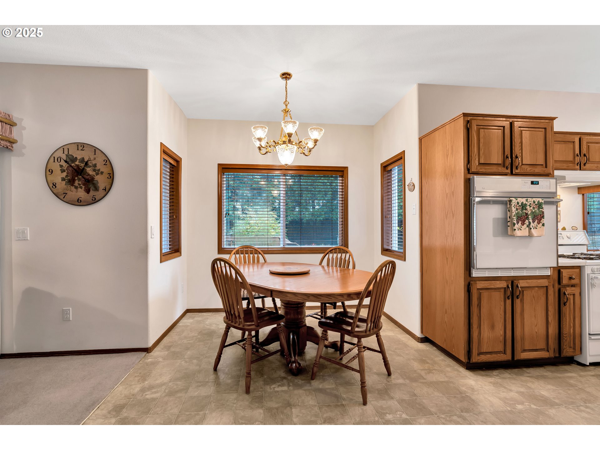 7829 Southwest 174th Place Beaverton, OR 97007 - Photo 14 of 45 a view of a dining room with furniture window and outside view