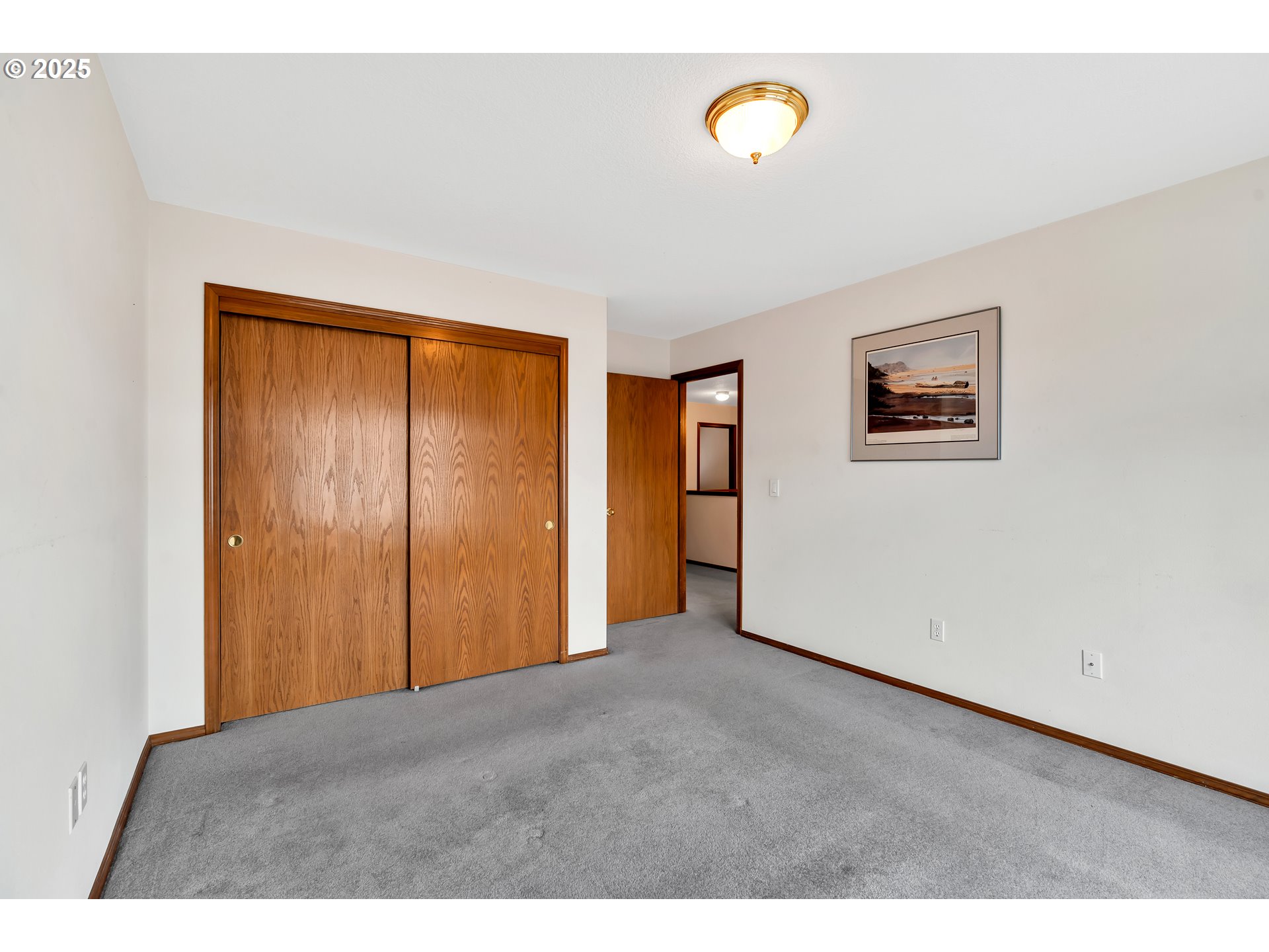 7829 Southwest 174th Place Beaverton, OR 97007 - Photo 25 of 45 a view of an empty room with a window