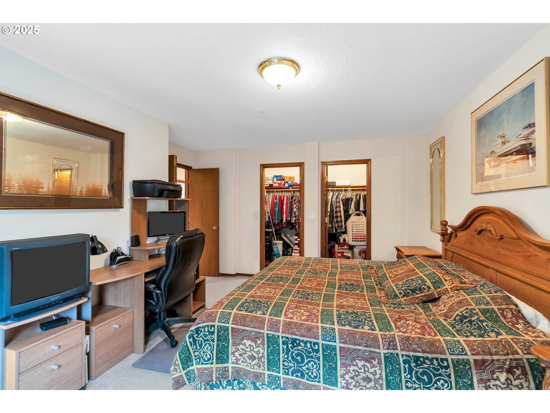 7829 Southwest 174th Place Beaverton, OR 97007 - Photo 30 of 45 a bedroom with a bed and a desk