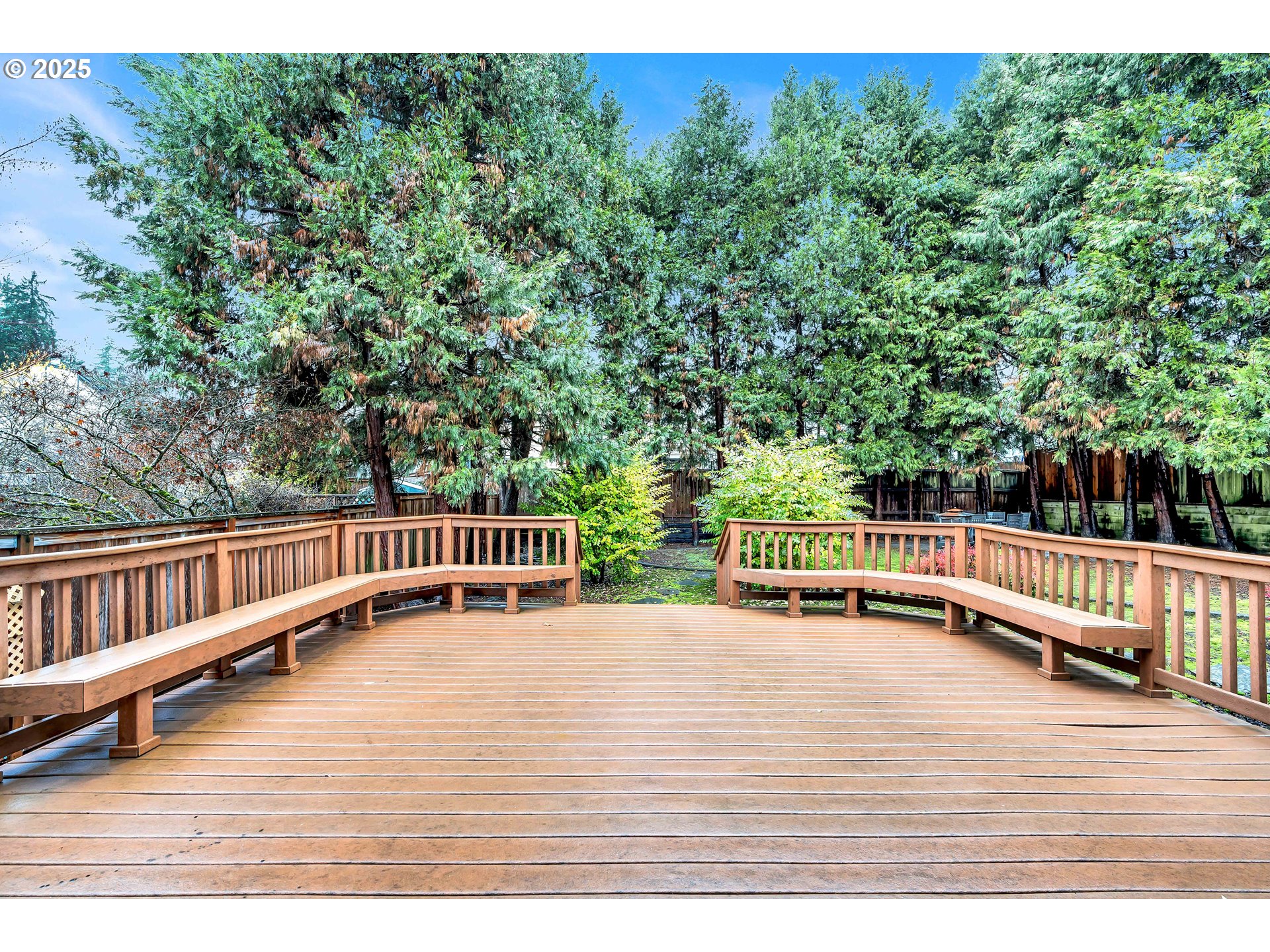 7829 Southwest 174th Place Beaverton, OR 97007 - Photo 37 of 45 a view of a roof deck with wooden floor and fence