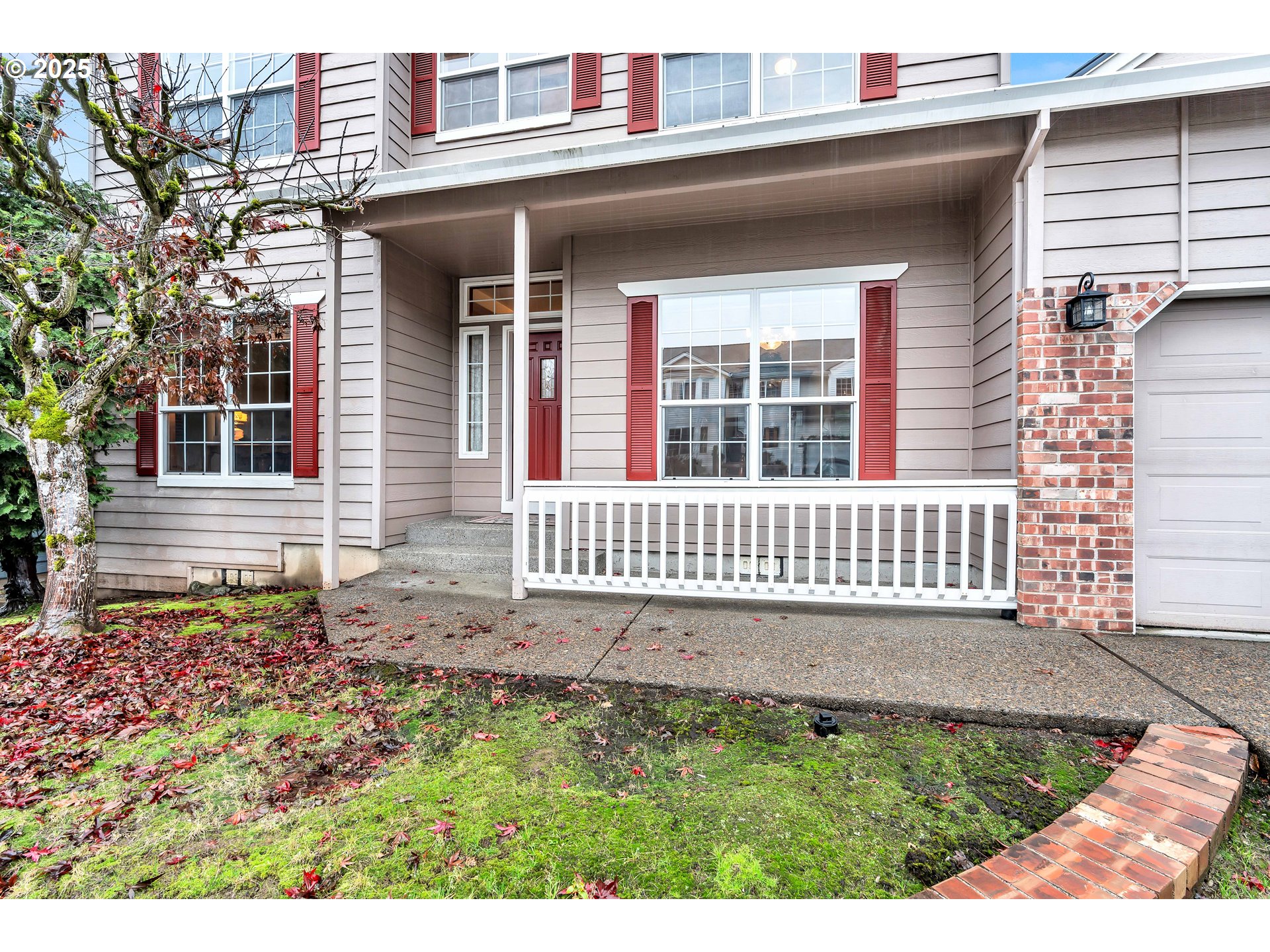 7829 Southwest 174th Place Beaverton, OR 97007 - Photo 4 of 45 front view of a house with a yard