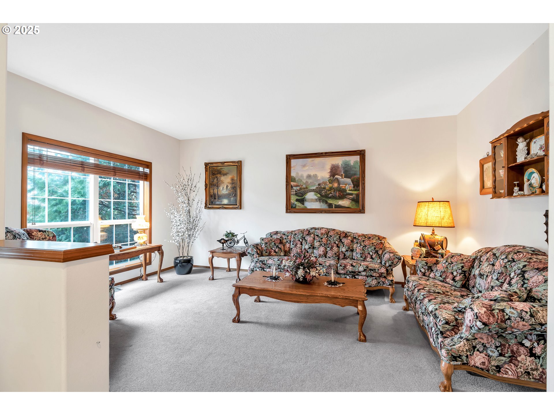 7829 Southwest 174th Place Beaverton, OR 97007 - Photo 6 of 45 a living room with furniture large window and dresser