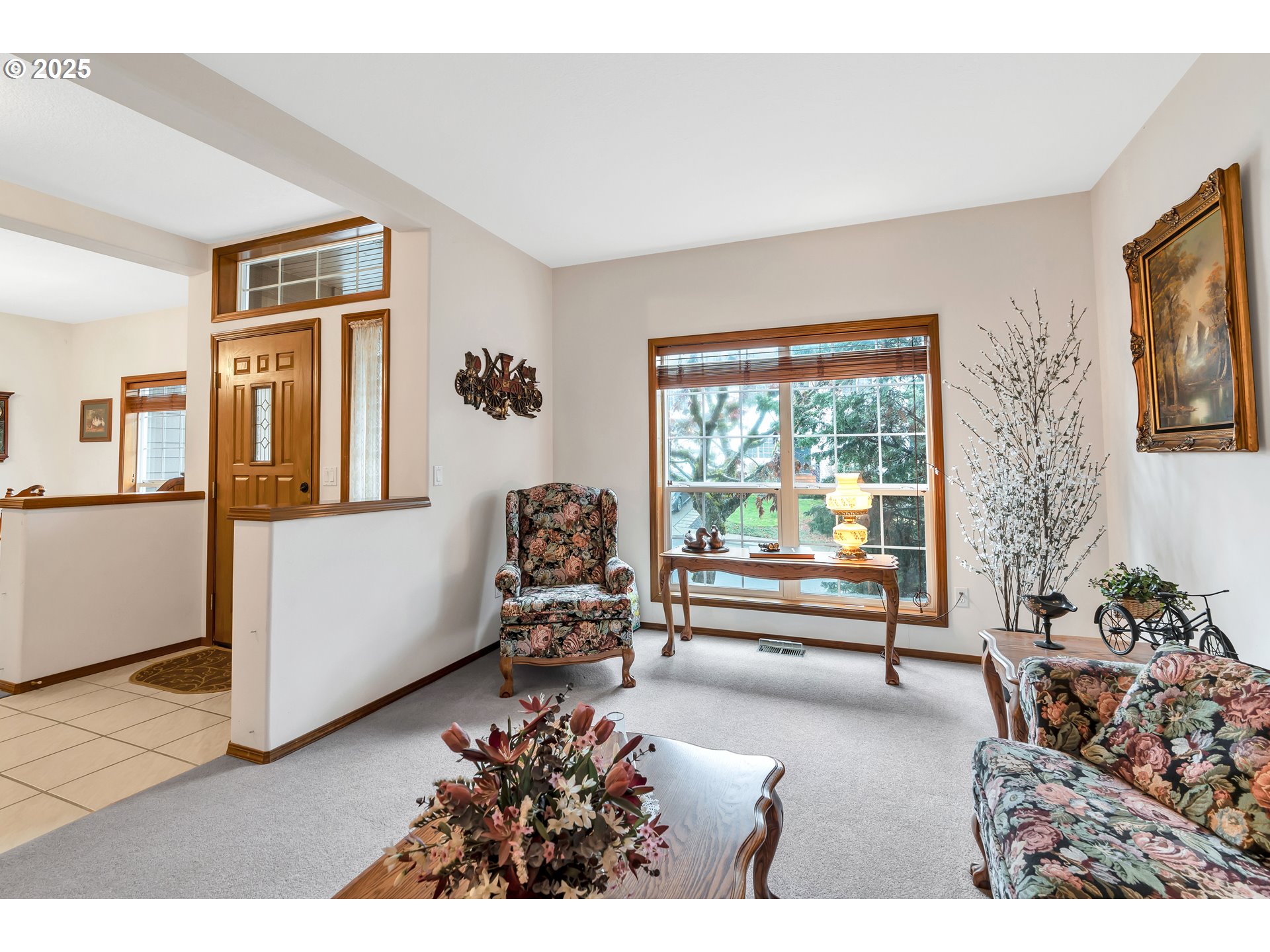 7829 Southwest 174th Place Beaverton, OR 97007 - Photo 7 of 45 a living room with furniture and a window
