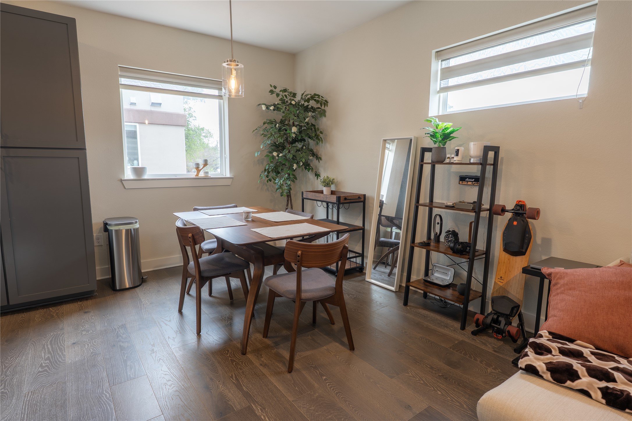 2827 Manor Road, Unit 4101 Austin, TX 78722 - Photo 12 of 38 This living area features hardwood floors, recessed lighting, and windows providing natural light