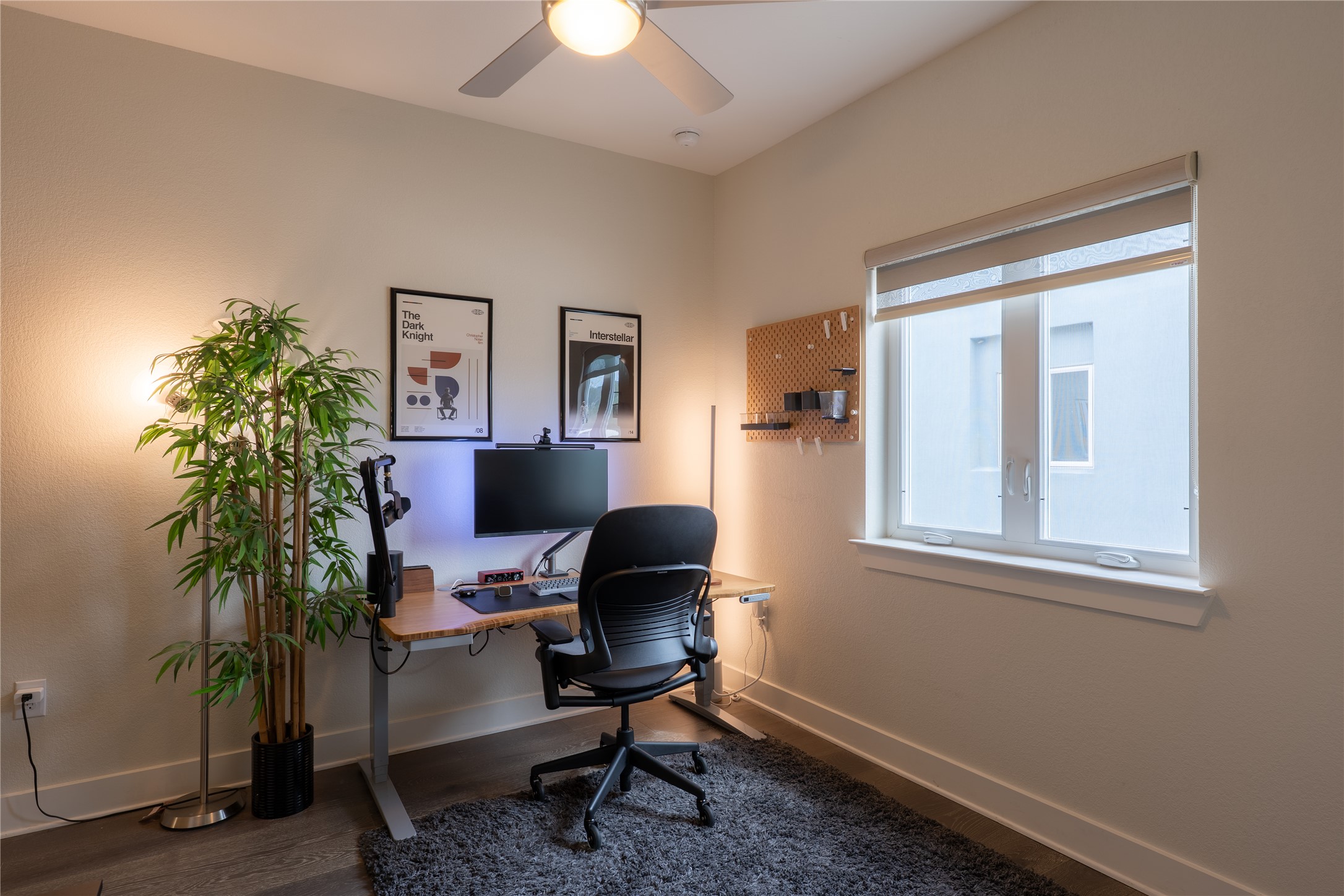 2827 Manor Road, Unit 4101 Austin, TX 78722 - Photo 30 of 38 This room features light-colored walls, a ceiling fan, and a window with blinds
